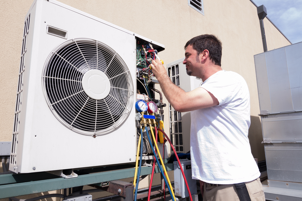 HVAC Technician HVAC technician working on a mini-split condensing unit